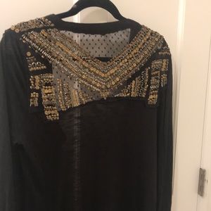 Long ecote beaded cardigan.